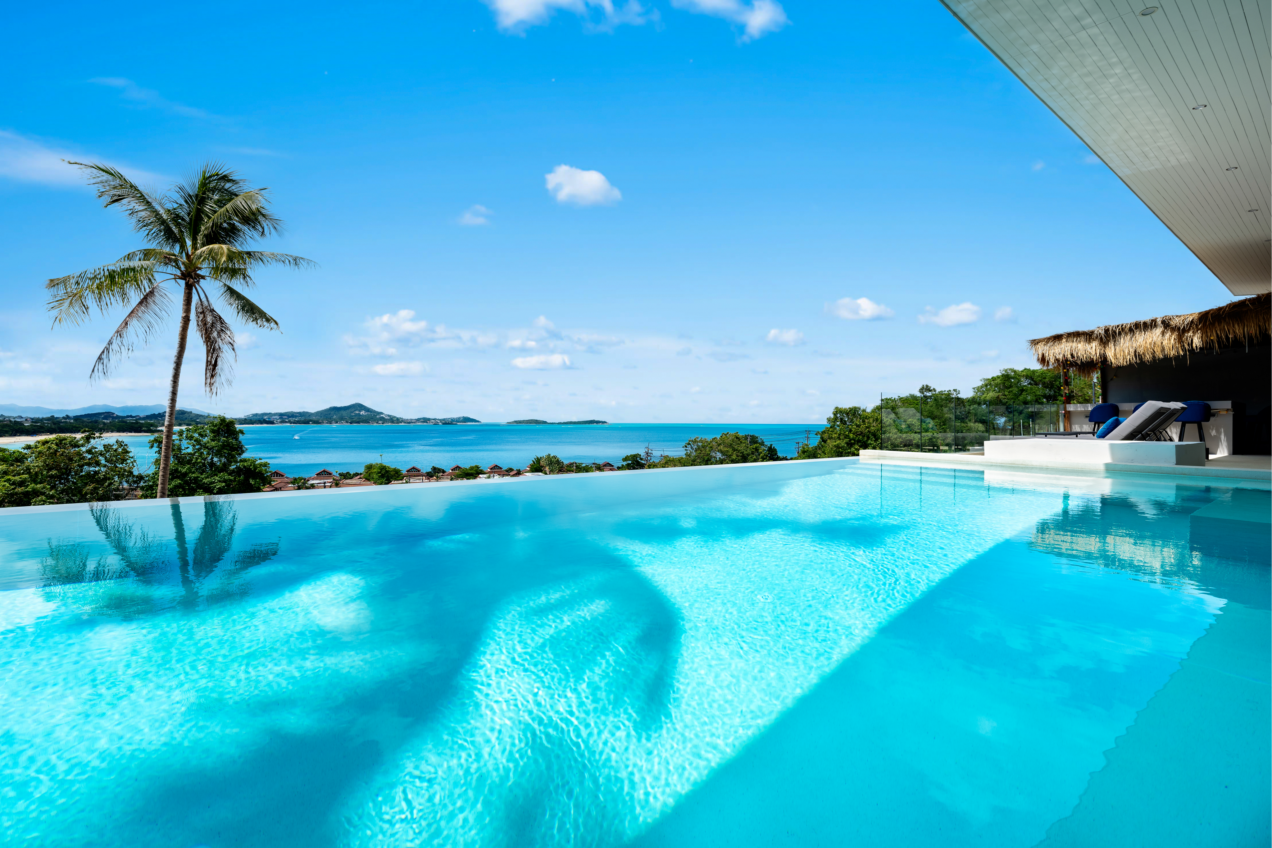 Infinity pool at a Koh Samui villa looking out over the bay